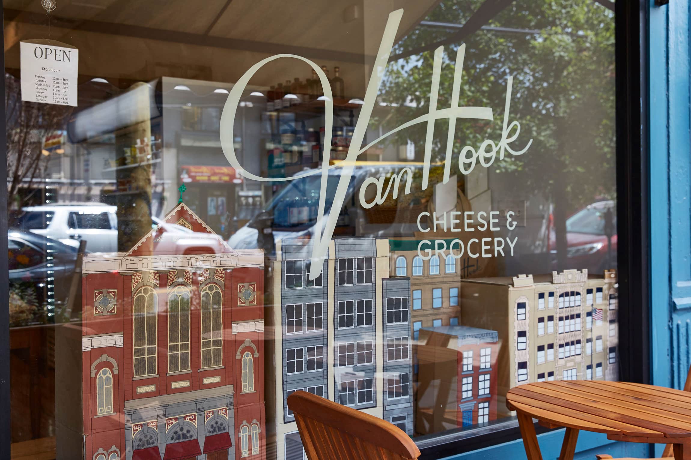 An outside image of window of Vanhook Cheese & Grocery